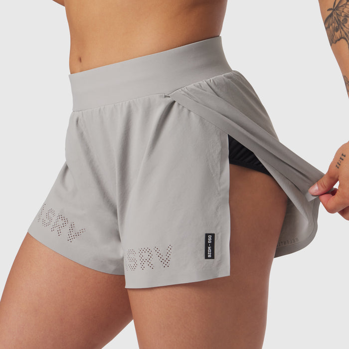 Aerotex Side Split Run Short in slate grey, worn by model showing side split detail and black inner shorts