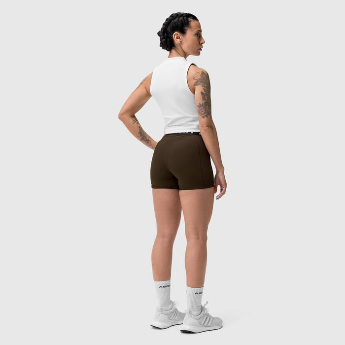 W027 Lycra Ribbed Short in Dark Earth, worn by model in profile stance