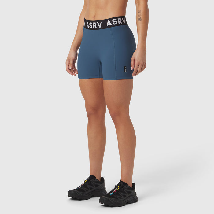 W027 Lycra Ribbed Short in storm blue, modeled with black sneakers, front view
