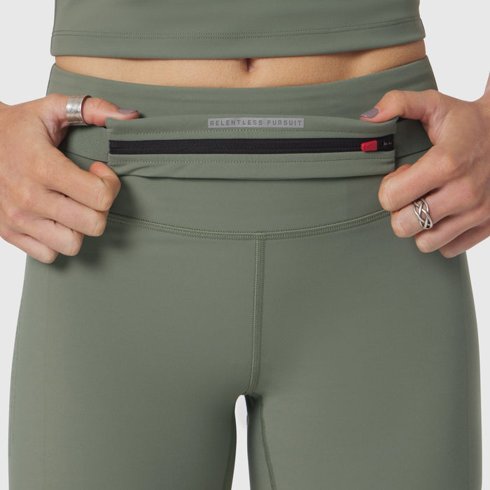 Lycra 3-in-1 Biker Short in sage worn by model, waistband detail view