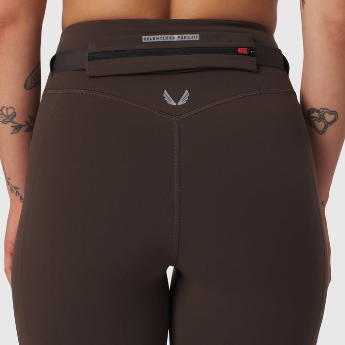 W030 LYCRA® 3-in-1 Legging in Dark Earth, back view on model