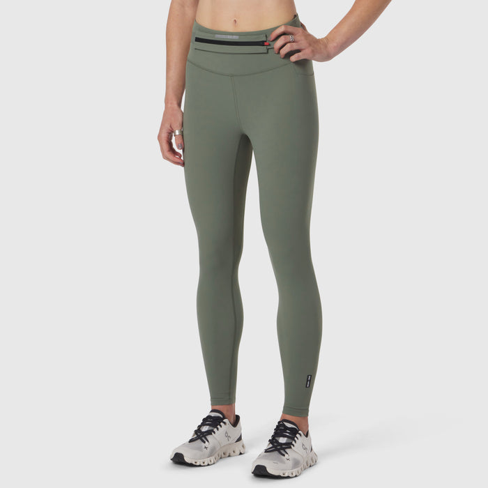 W030 LYCRA® 3-in-1 Legging in sage, worn with sneakers, front view