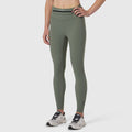 W030 LYCRA® 3-in-1 Legging in sage, worn with sneakers, front view