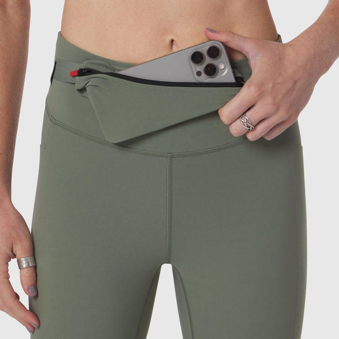 LYCRA® 3-in-1 Legging in sage, model wearing and displaying waistband pocket