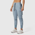 Tetra-Lite Cargo High Rib Jogger in Light Sky, worn by model with white sneakers