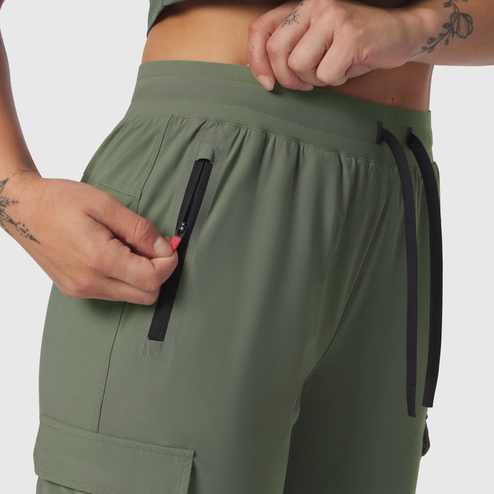 Tetra-Lite Cargo High Rib Jogger in sage, model detail shot of zipper pockets
