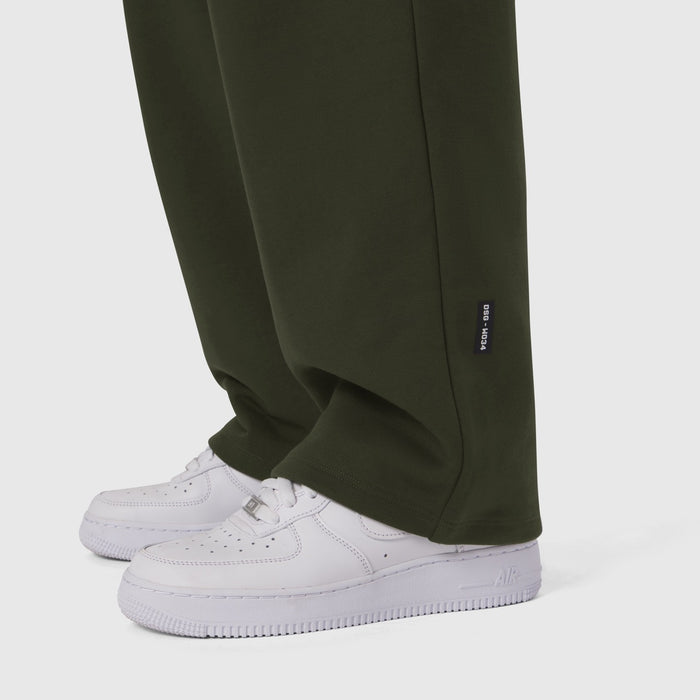 Olive Sorona® Terry straight leg sweats on model wearing white sneakers, cropped leg view