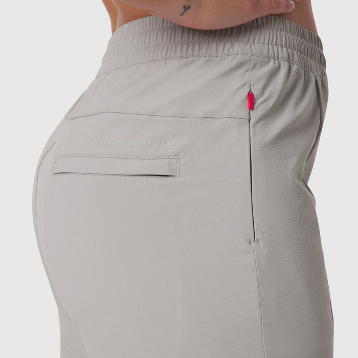Ripstop Relaxed Track Pant in slate grey, side view on model showing pocket detail