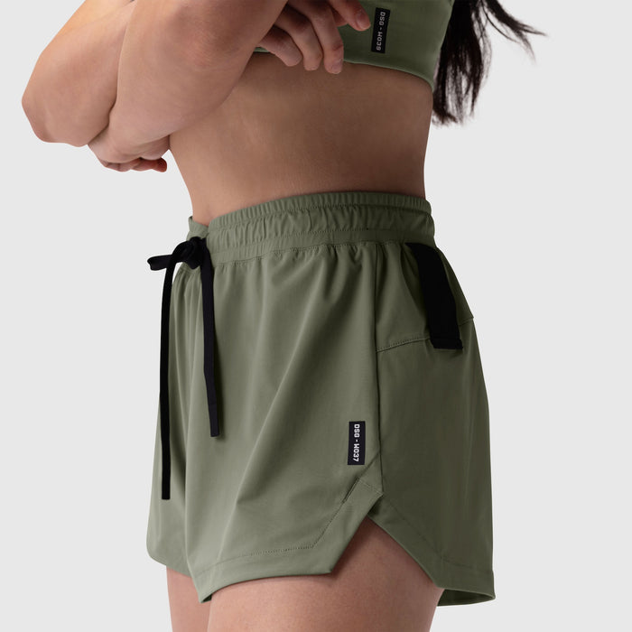 Tetra-Lite Linerless Short in sage, worn by model, side view
