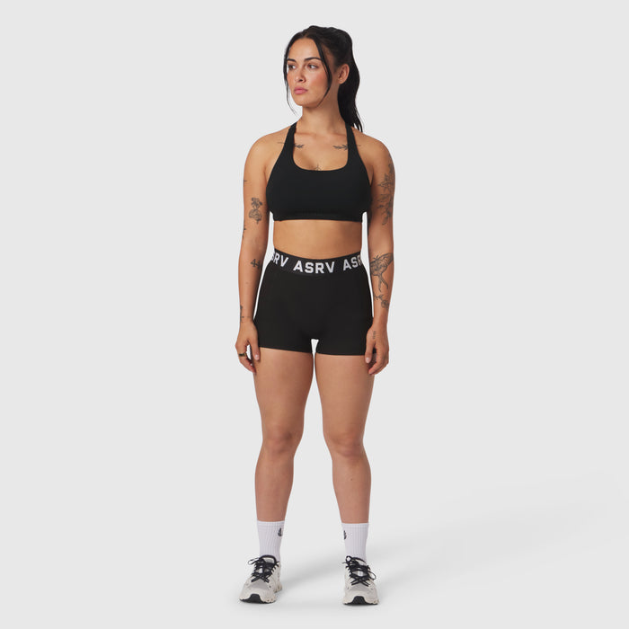 Black LYCRA® Hybrid Sports Bra worn by model, front view