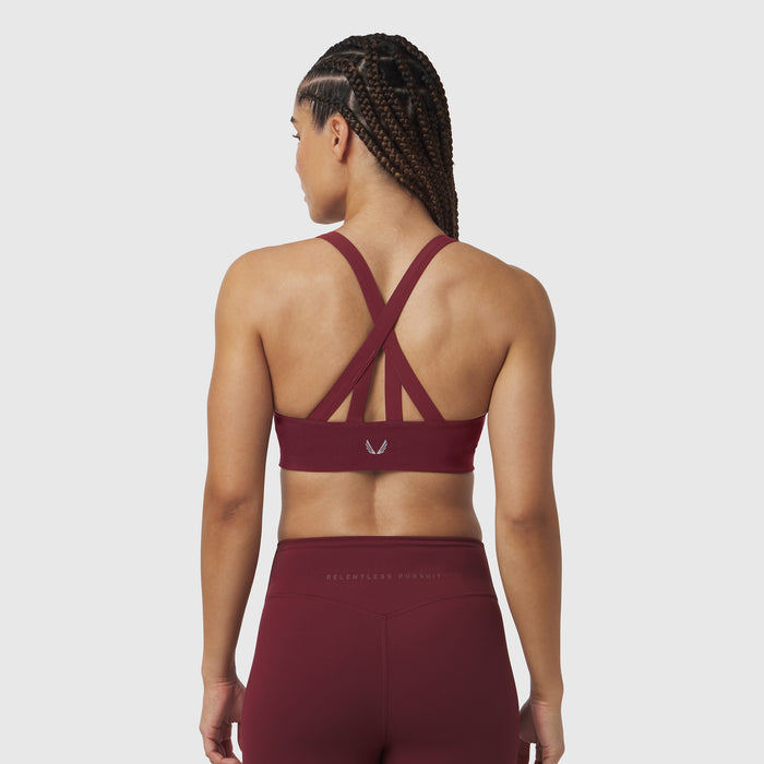 W039 Lycra Hybrid Sports Bra in crimson, back view on model