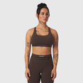 W039 Lycra Hybrid Sports Bra in dark earth, front view on model