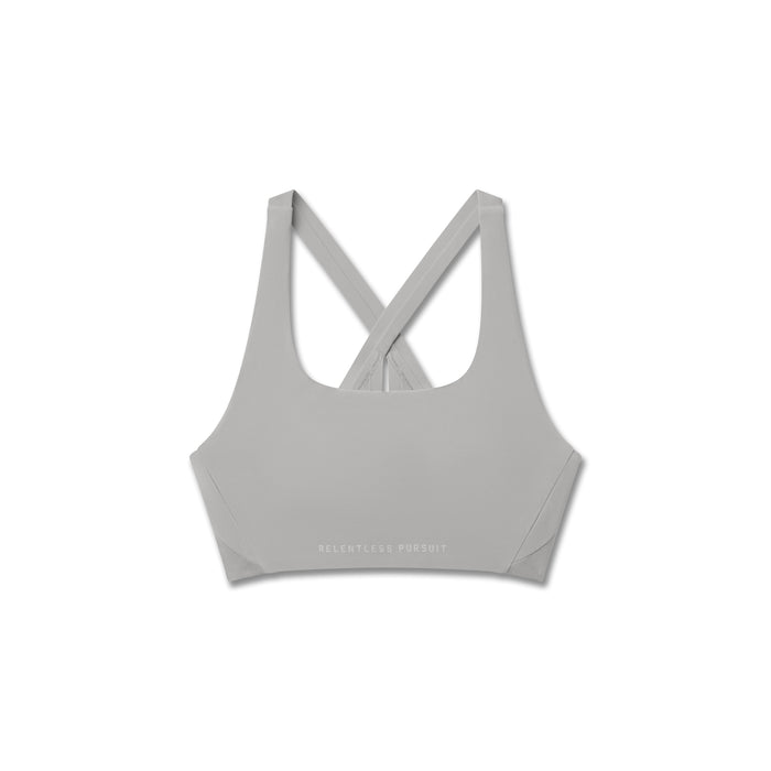 Flatlay of Lycra Hybrid Sports Bra in slate grey, front view with crossback straps
