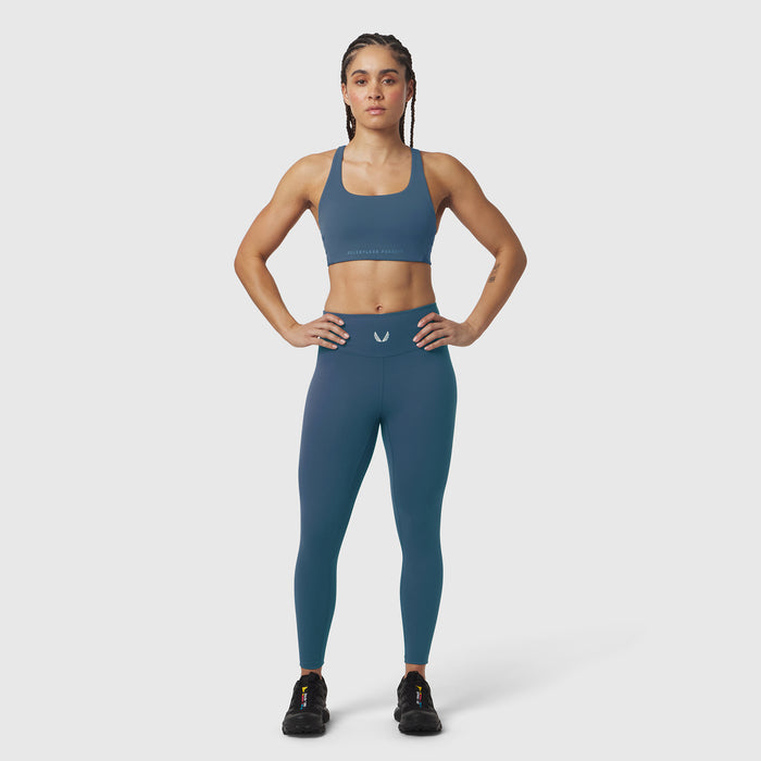 W039 Lycra Hybrid Sports Bra in storm blue, front view on model