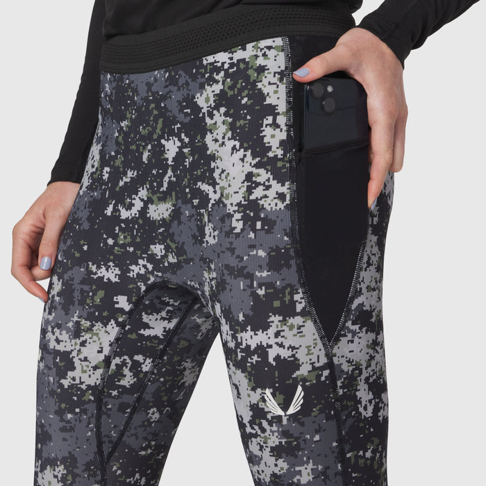 Lycra Ribbed Running Tight in pixel camo worn by model, side view with hand in pocket