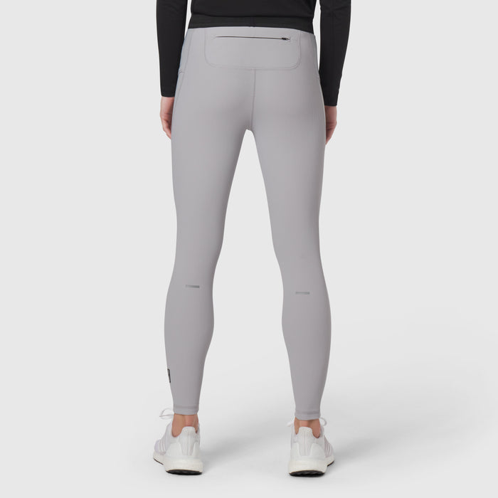 Lycra Ribbed Running Tight in slate grey, back view on model wearing white sneakers