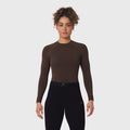 LYCRA® ADAPTIV Baselayer Longsleeve in Dark Earth, worn with black leggings, front view