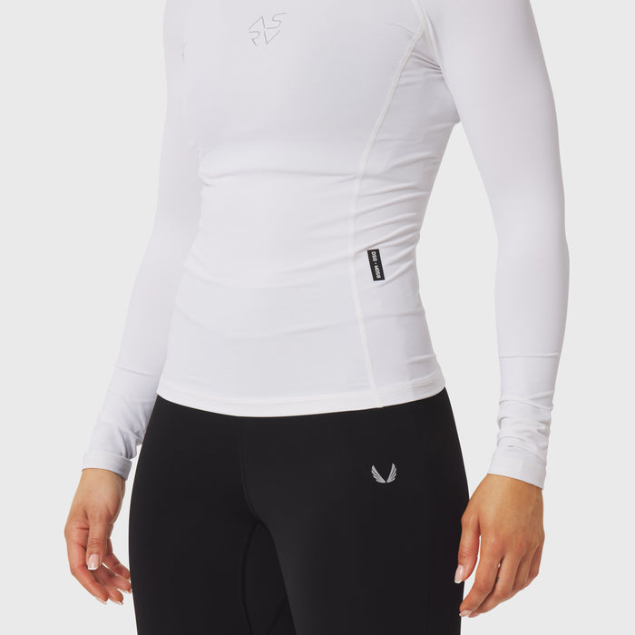 LYCRA® ADAPTIV Baselayer Longsleeve in white, worn with black leggings, side view