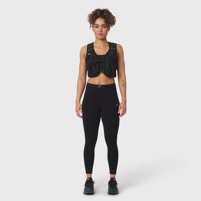 Black hybrid belt-pack run legging on model, front view