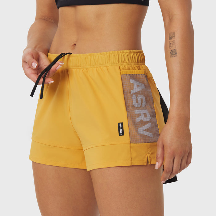 Tetra-Lite Adventure Short in amber yellow worn by model, side view