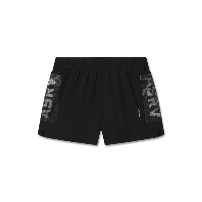 Flatlay of black Tetra-Lite Adventure Short with gray side panels, front view