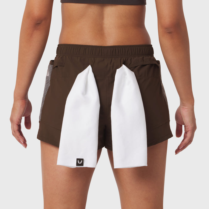 Tetra-Lite Adventure Short in Dark Earth with white panel detail, worn by model from waist down