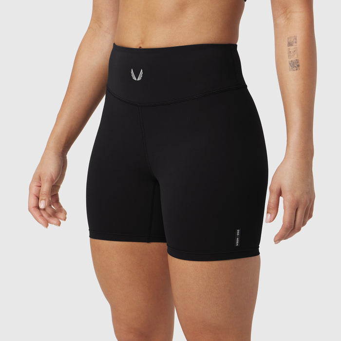 Black LYCRA® ADAPTIV Biker Short worn by model, front view