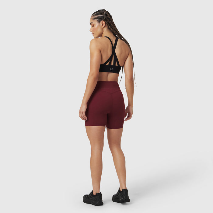 LYCRA® ADAPTIV Biker Short in Crimson, worn by model in back view