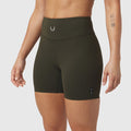 W064 LYCRA® ADAPTIV Biker Short in olive, worn by model, front view