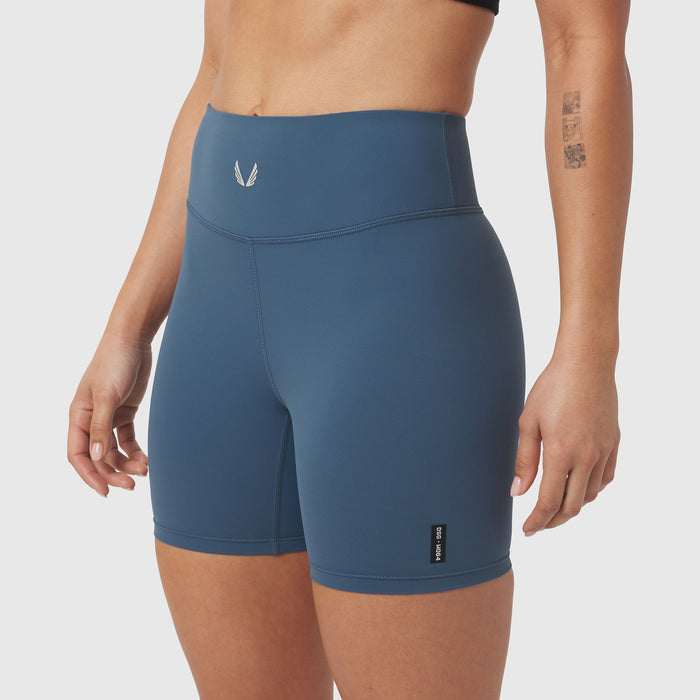 LYCRA® ADAPTIV Biker Short in storm blue, worn by model, front view