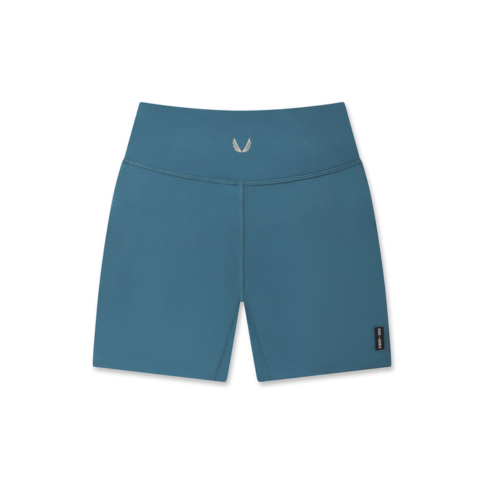 flatlay LYCRA® ADAPTIV Biker Short in storm blue, front view