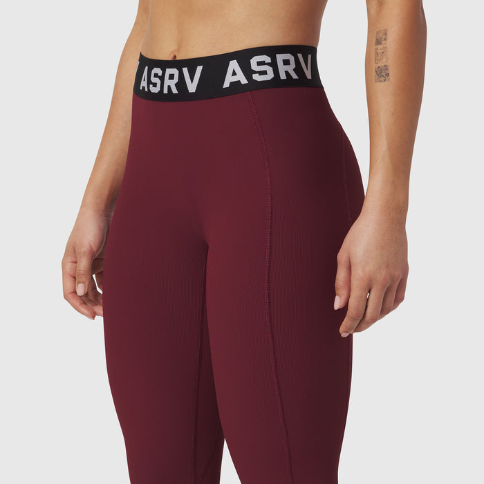 W071 LYCRA® Ribbed Legging in crimson, modeled from waist down showing fitted silhouette