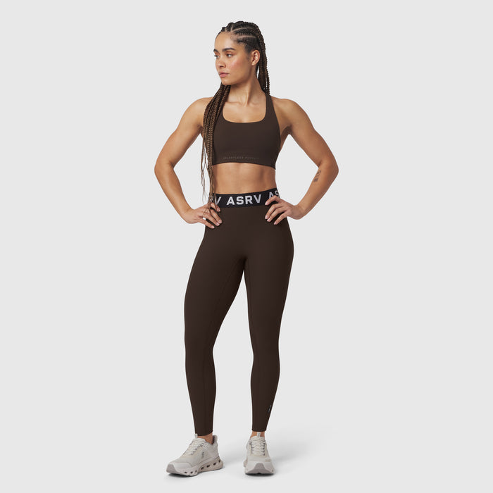 W071 Lycra Ribbed Legging in dark earth, worn by model in sports bra, front pose