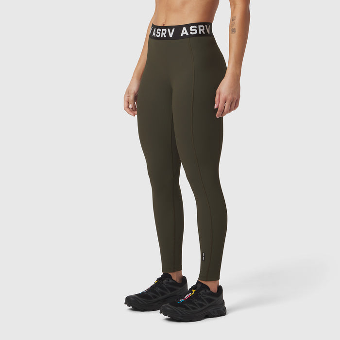 W071 Lycra Ribbed Legging in olive, modeled with black sneakers, side view