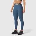 W071 Lycra Ribbed Legging in storm blue, worn by model with black sneakers