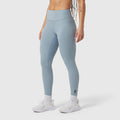 W072 LYCRA® ADAPTIV 4 Pocket Legging in light sky, worn with white sneakers, side view