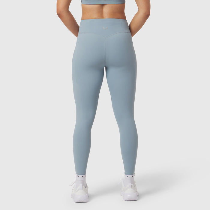 Light sky LYCRA® ADAPTIV 4 Pocket Legging worn by model, back view