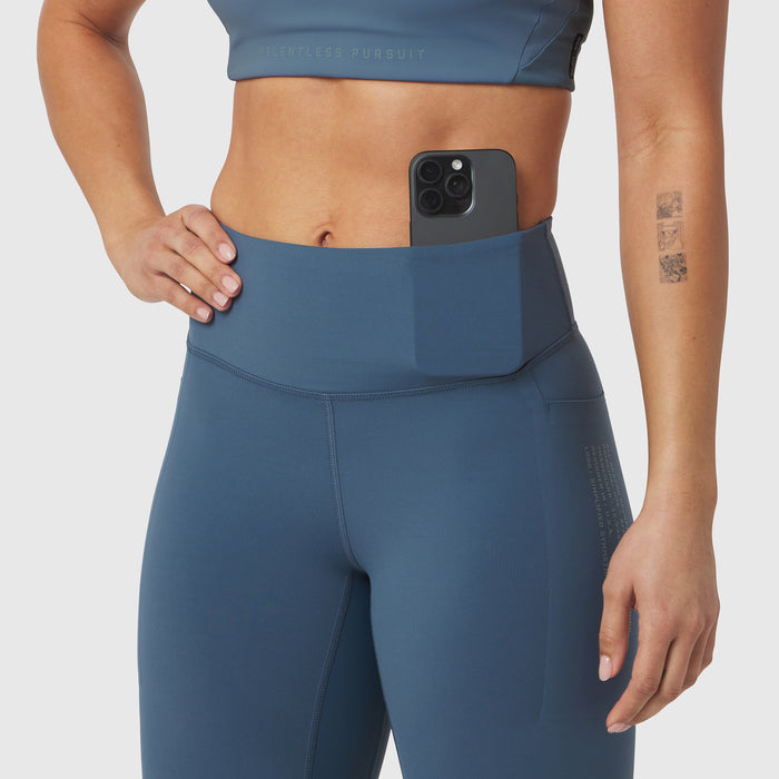 W072 LYCRA® ADAPTIV 4 Pocket Legging in Storm, worn by model showing waistband pocket detail