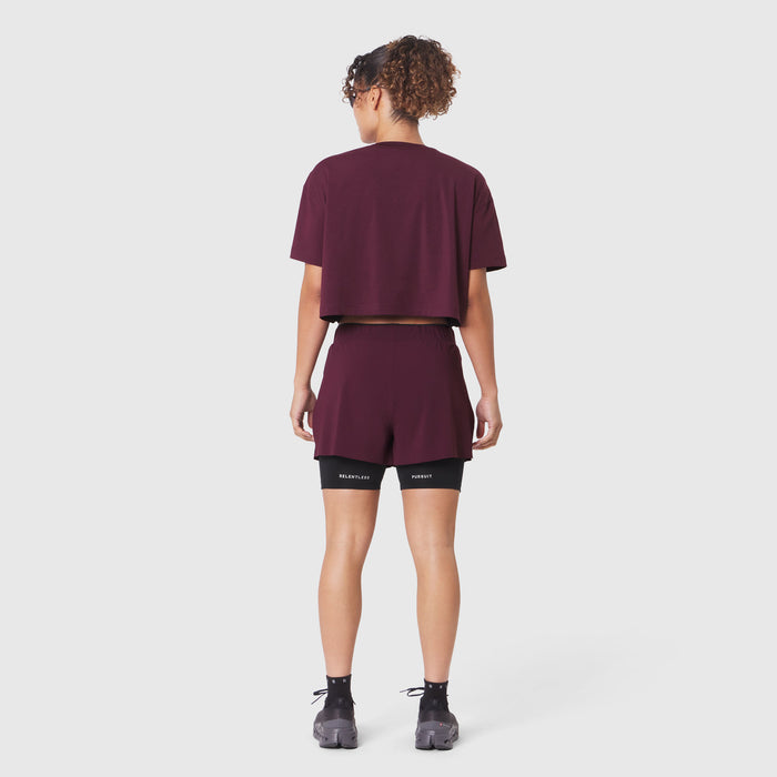 W082 Supima Ice-Skin Reversible Crop Tee in Merlot worn with black shorts, back view