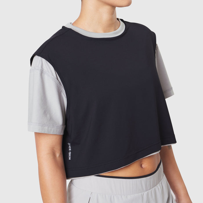 Reversible crop tee in slate grey and black, worn by model, front view