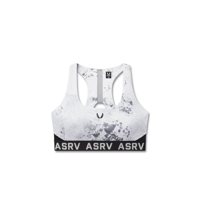 Flatlay LYCRA® ADAPTIV Racerback Sports Bra in Sedona Snow Camo, front view