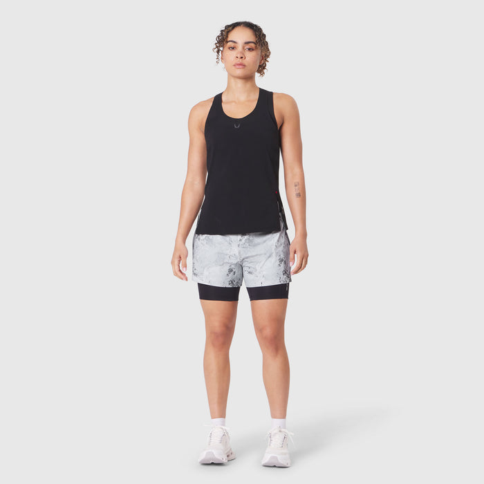 Aerotex™ Perforated Run Tank in black with patterned shorts, front view