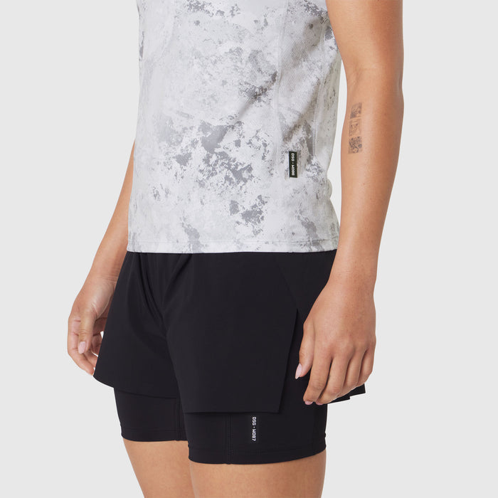 AEROSILVER® UPF50+ Run Tee in Sedona Snow Camo worn with black shorts, side view