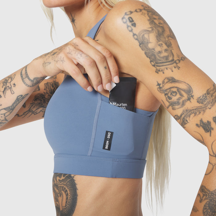 W096 LYCRA® ADAPTIV Racerback Sports Bra in Slate Blue, worn by model