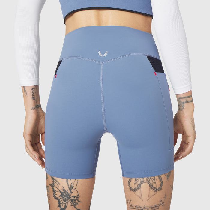 W099 LYCRA® ADAPTIV Hybrid Bike Short in Slate Blue, back view on model
