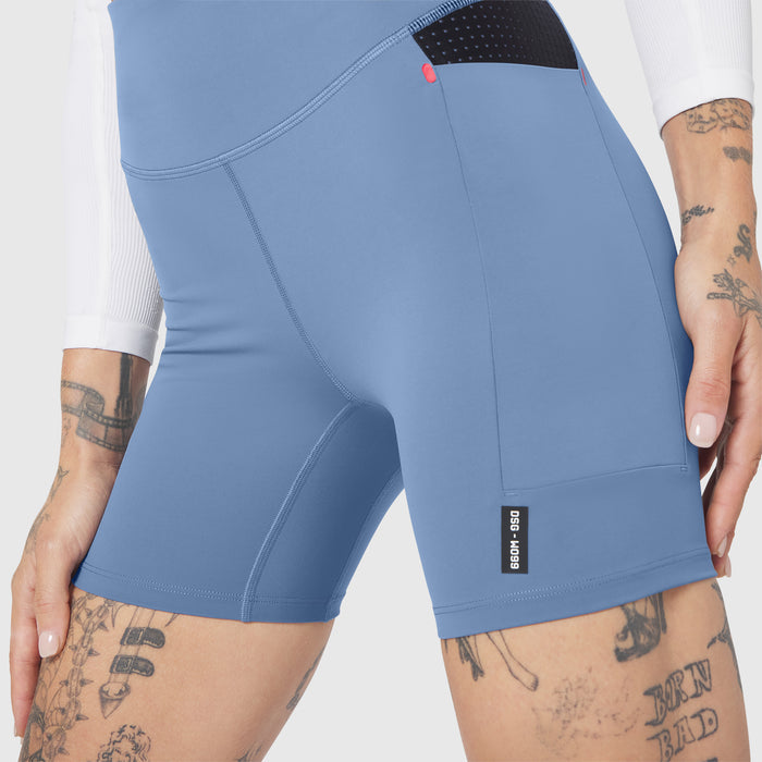 W099 LYCRA® ADAPTIV Hybrid Bike Short in Slate Blue, worn by model