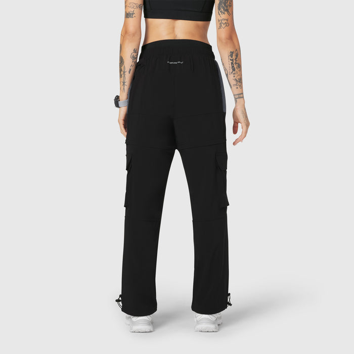 W100 2-in-1 Convertible Pant in black, back view on model