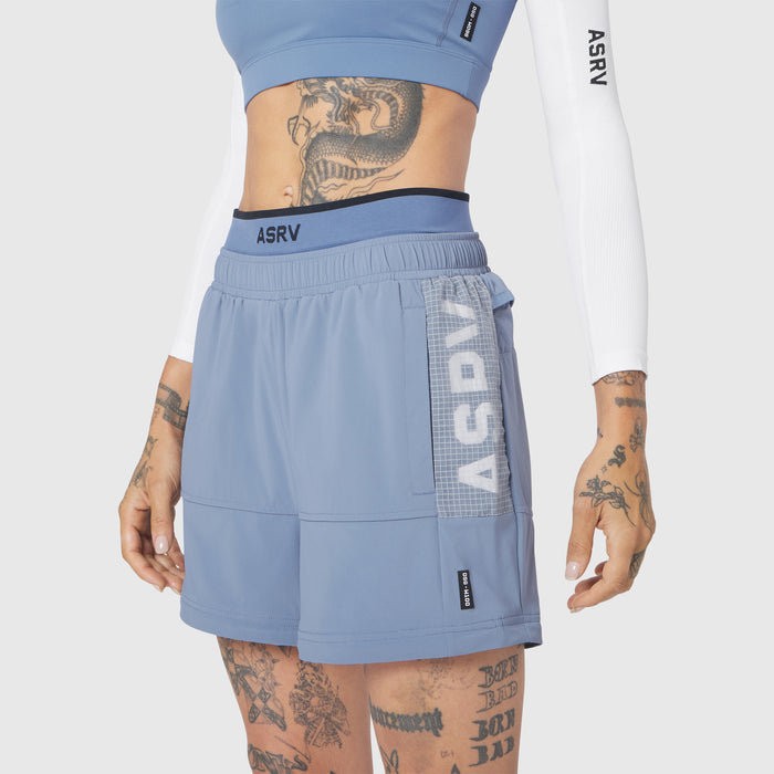 W100 2-in-1 Convertible Pant in Slate Blue, worn by model, front view