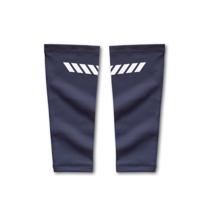 flatlay WarpFlexx® Calf Sleeves in navy with white diagonal stripe detail, front and back view
