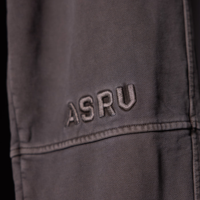 WN'20 Terry Relaxed Jogger in charcoal, detail shot of embroidered ASRV logo on thigh